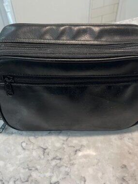A Gentleman's Black Traveling Cosmetic Bag w/3 Zipper Pockets & Interior Pockets